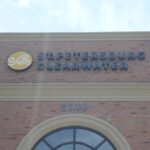 Channel Letters vs Reverse Channel Letters: Which One Fits Your Largo Storefront Channel letters spelling St. Petersburg Clearwater mounted on a brick building facade